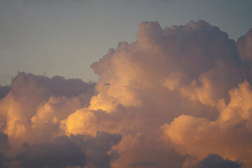 Airplane in huge clouds