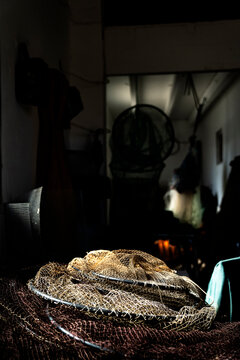 Illuminated fisherman's nets with a darkened background