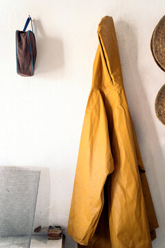 Raincoat hanging on a wall