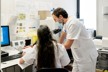 Medical Workers Working together in lab