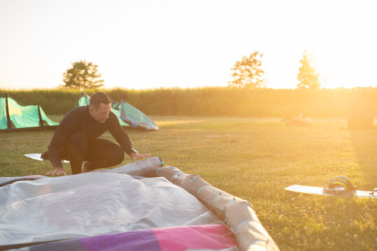 Organising Kite Surfing Belongings at Sunset
