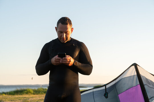 Kite Surfer Using Mobile Phone