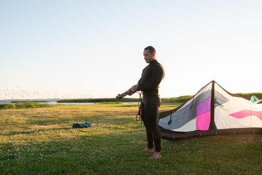 Man Organising Kite Surfing Belongings