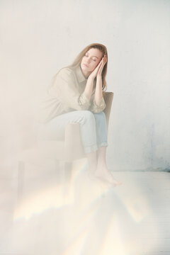 Woman behind abstract blur