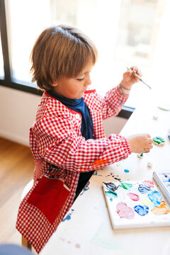 Kid Painting At Home