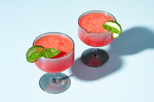 Watermelon Cocktails with Basil and Cucumber Garnish 