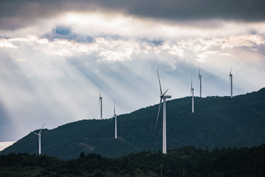 Rays Of Sunlight and Wind Turbine