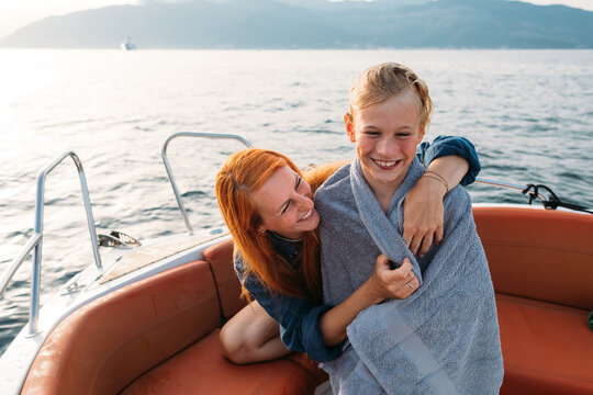 Woman and Her Son in Boat 