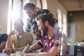 Creative business people brainstorming and working in office