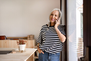 Mature woman calling by phone