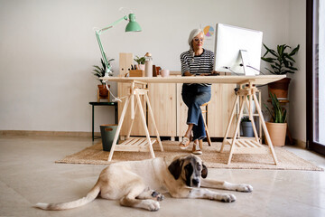 Big dog with its owner at office