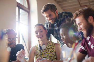 Creative business people brainstorming and working in office