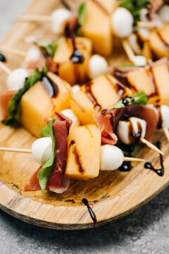 Prosciutto Melon Skewers with balsamic reduction
