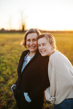 Mom and daughter outside together.