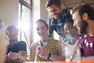 Creative business people brainstorming and working in office