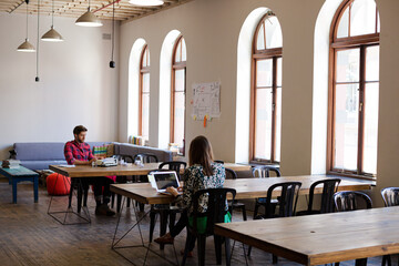Casual business people working in office