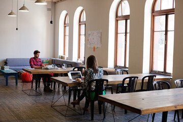 Casual business people working in office