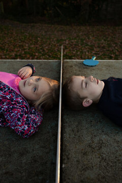 Siblings whisper secrets