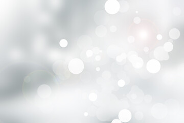 white and gray snowflakes blur abstract background. bokeh christmas blurred beautiful shiny Christmas lights.