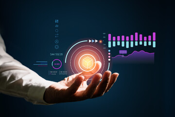 Businessman hold growing business graph and analysis financial data on virtual screen. Business planning and strategy Concept