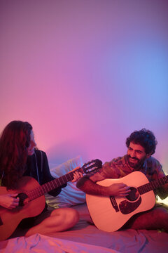 Playing guitar and enjoying the moment so much