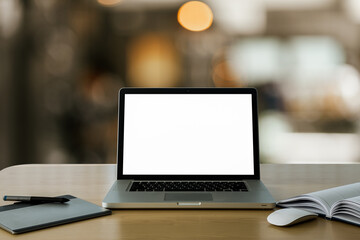 laptop on wood table,background for light bokeh.	
