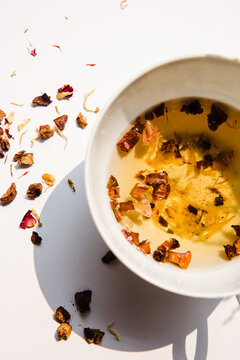 Fruit herbal tea in a porcelain cup