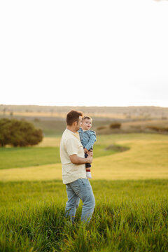 Father with son in field