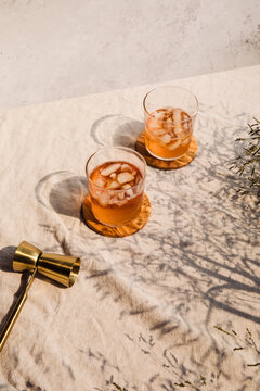 Pair of iced whiskey glasses and a double jigger