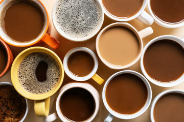 Obraz na płótnie Canvas Cups of tasty coffee on light background