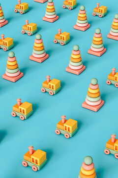 rainbow rings and train on blue background - kids toys