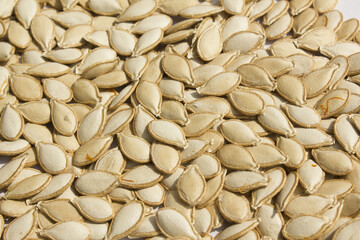 close up brown pumpkin seeds.