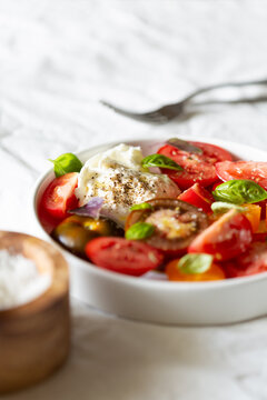 Colorful tomato salad with burrata