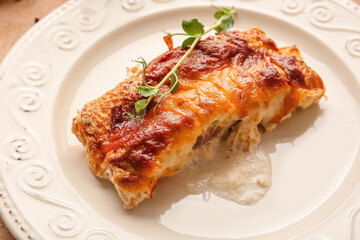 Plate with piece of delicious casserole with minced meat, closeup