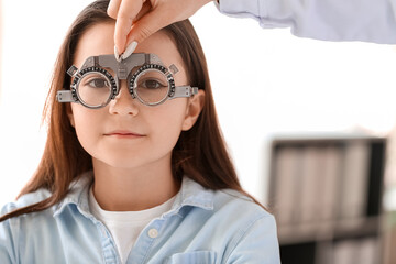 Little girl undergoing eye test in clinic