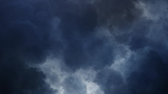4k POV thunderstorm in dark sky and cumulonimbus clouds