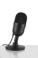 Modern microphone on white background