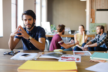 Portrait confident casual businessman in sunny office