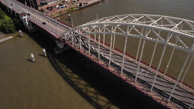 Drone Over Arch Bridge With Traffic In Noord River Near Hendrik ido ambacht, Alblasserdam In The Netherlands. - Aerial