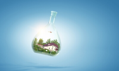 House inside a floating glass bottle