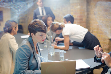 Business people talking in conference room meeting