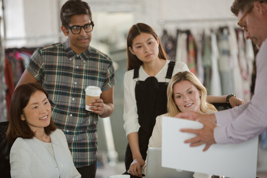 Fashion Designers Meeting In Sunny Office