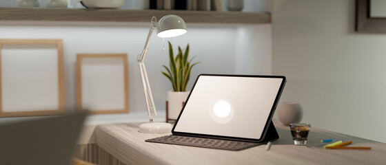 Modern home office interior with digital tablet mockup and keyboard on working desk
