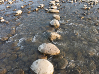 Stone path way in river water