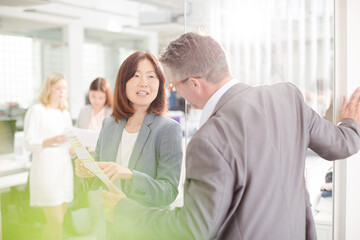 Fototapeta premium Business people talking in office