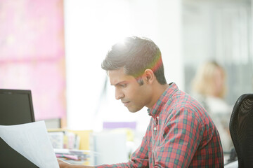 Fashion designer working at desk