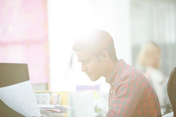 Fashion designer working at desk