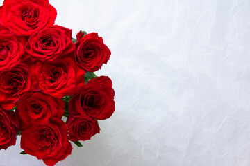 photo of a bouquet of red roses with a copy space on the right.