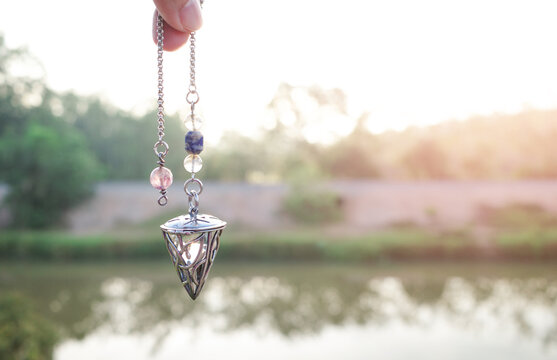 Foretelling the future with crystal pendulum.