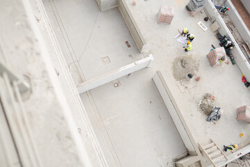Overhead view of construction workers at construction site